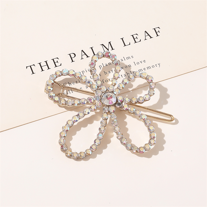 Chris Rubin Evie Hair Claw Gold - Flower - Hair Accessories | Fashiongirl